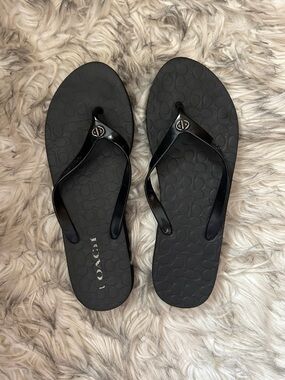 Coach Black Logo-Textured Patent Strap Flip Flop Sandals